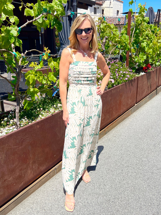 Leaf print green and ivory maxi sundress with thin straps and elastic back.