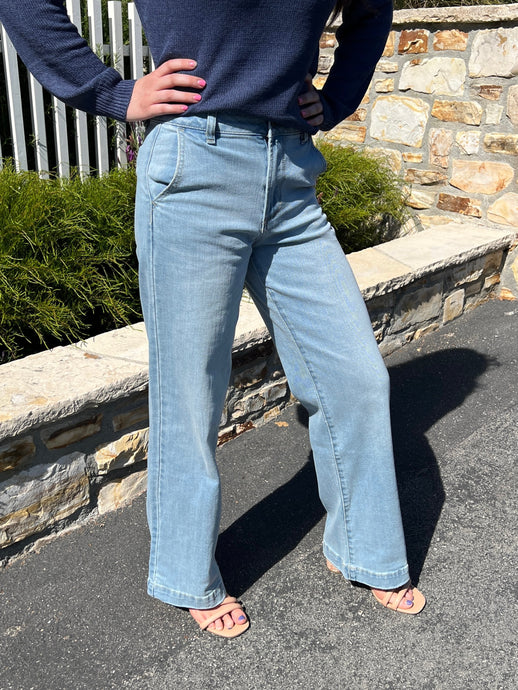 Trouser style jean with side pockets and a slightly flaired leg.